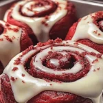 Red Velvet Cinnamon Rolls with Cream Cheese Frosting in Baking Tray
