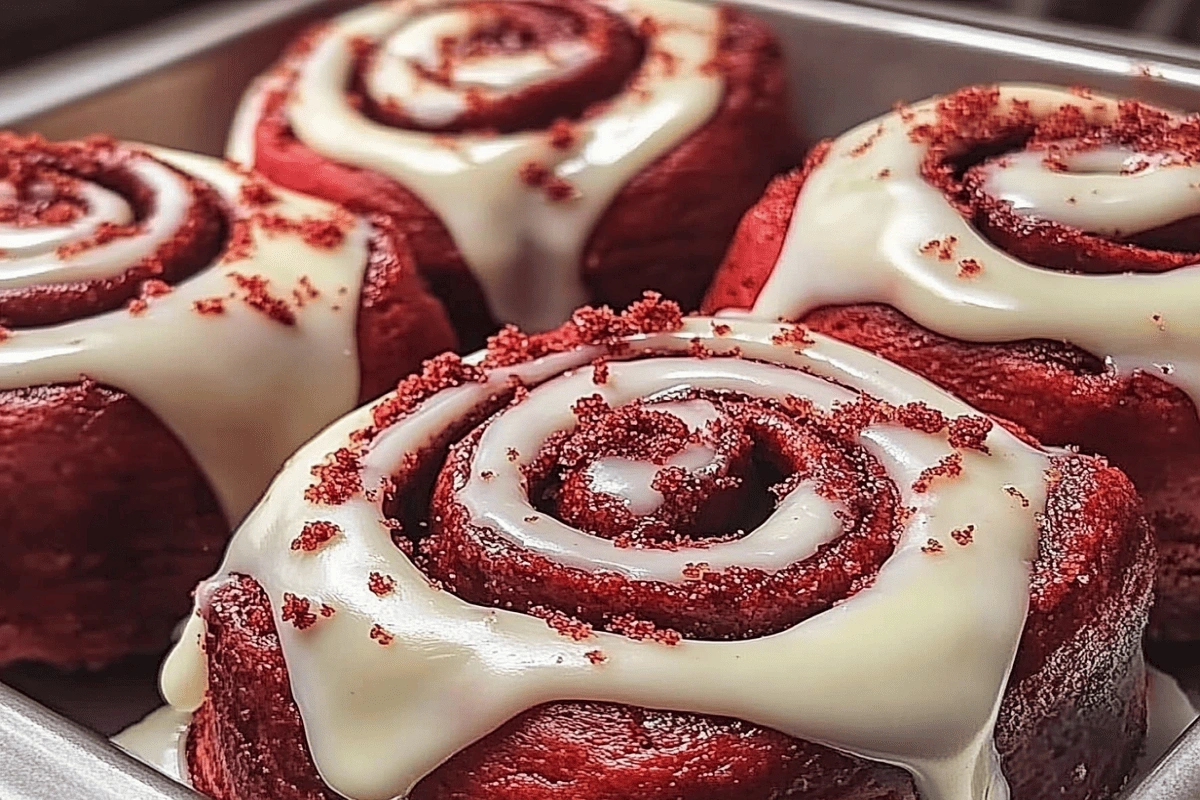 Red Velvet Cinnamon Rolls with Cream Cheese Frosting in Baking Tray