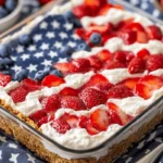 American Flag Strawberry Pretzel Salad with fresh berries and whipped cream
