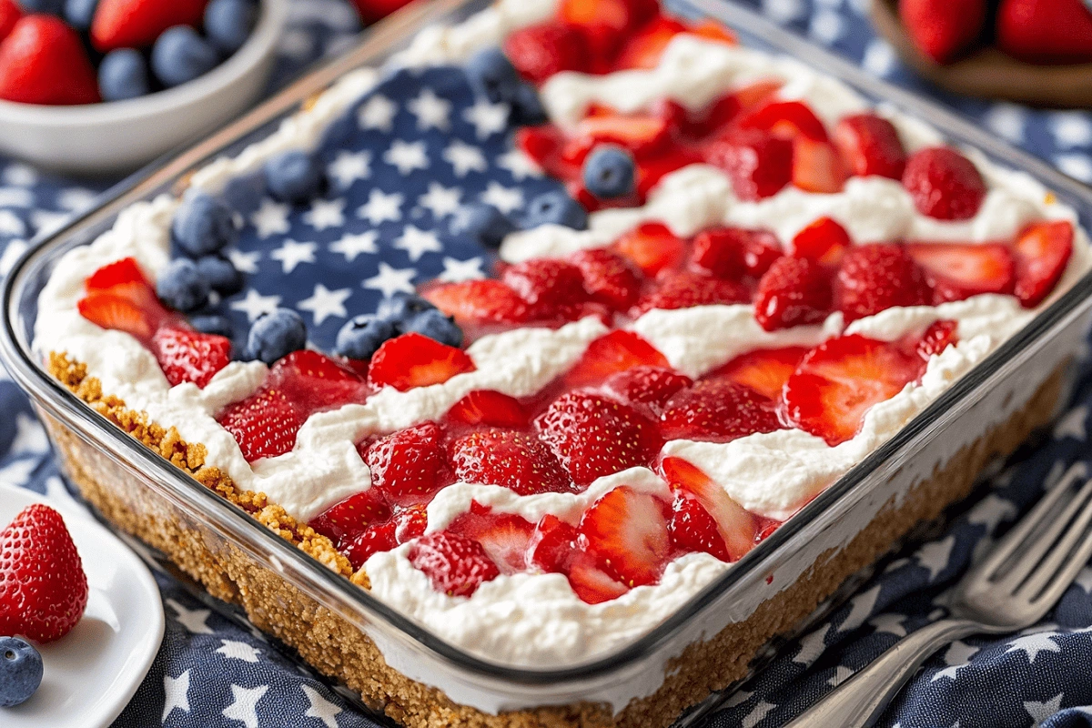 American Flag Strawberry Pretzel Salad with fresh berries and whipped cream