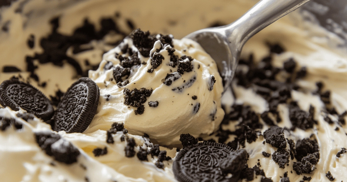 Oreo pieces folded into cheesecake batter