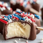 Fourth of July Cheesecake Pops with patriotic drizzle