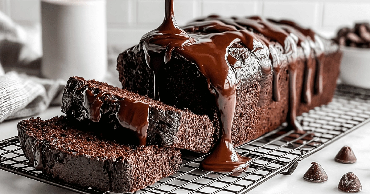 Pouring chocolate ganache over pound cake