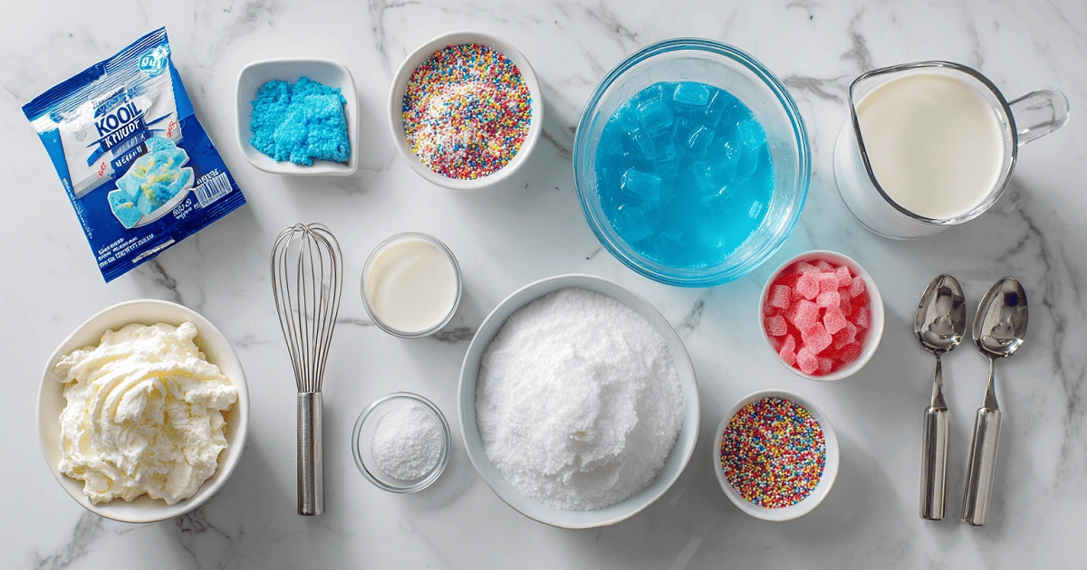 Ingredients for Blue Raspberry Kool-Aid Swirl Drink including Kool-Aid, milk, whipped cream, sugar, and sprinkles