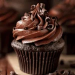 Super moist chocolate cupcake with creamy chocolate frosting swirl and curls